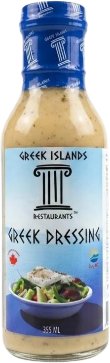 A 355 ml bottle of Greek Islands Restaurants Greek Dressing with a blue cap and a Greek salad on the label